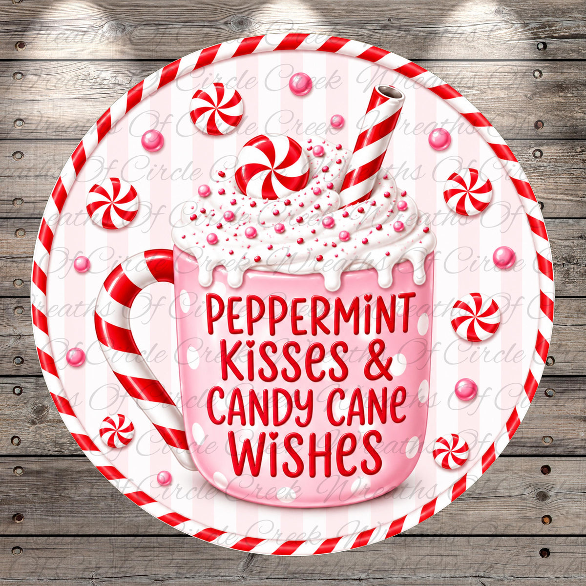 A pink mug filled with whipped cream and surrounded by red and white striped candy canes, with the text "Peppermint Kisses & Candy Cane Wishes" written on the mug.