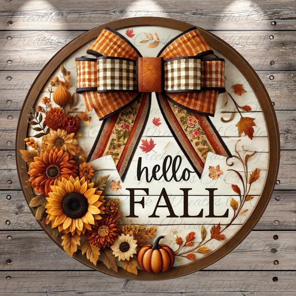 a wreath with a bow and sunflowers on it