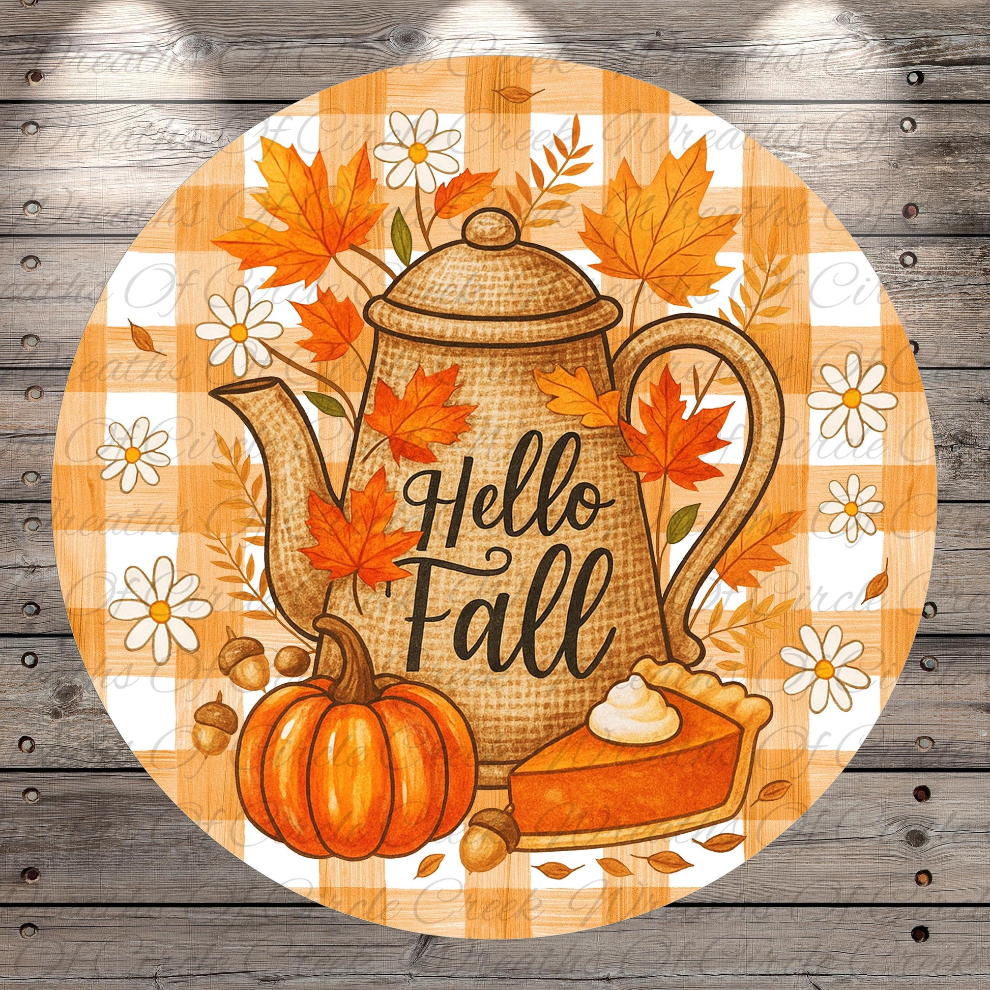 A round, wooden-paneled image featuring a teapot surrounded by autumn leaves, flowers, and a pumpkin with a pie on it. The text "Hello Fall" is displayed on the teapot.