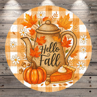 A round, wooden-paneled image featuring a teapot surrounded by autumn leaves, flowers, and a pumpkin with a pie on it. The text "Hello Fall" is displayed on the teapot.