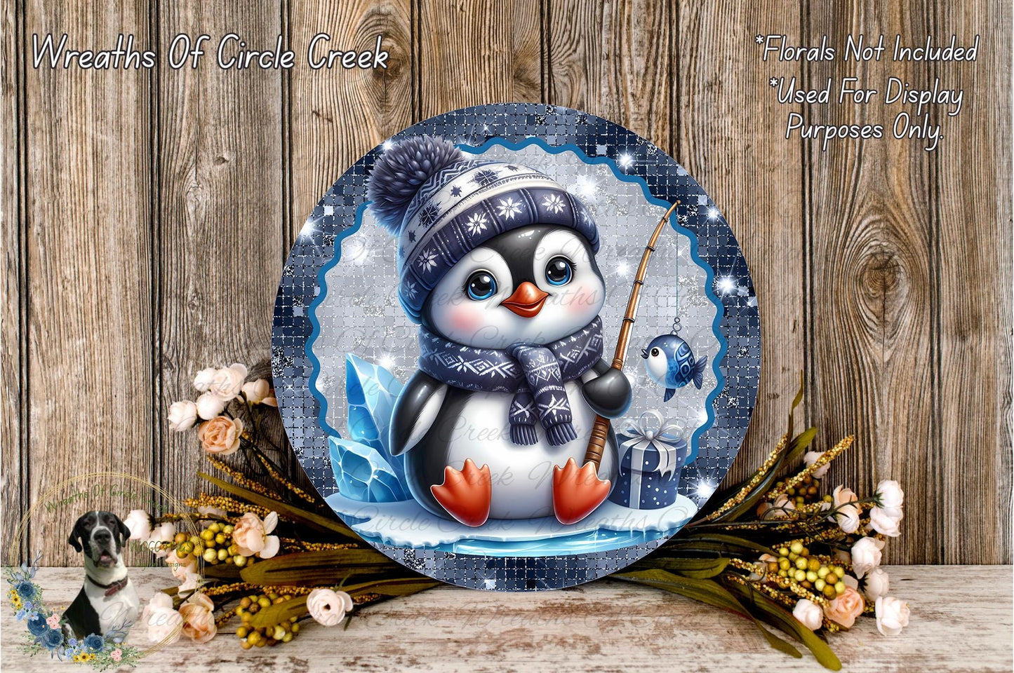A decorative plate featuring a cute penguin wearing a winter hat and scarf, holding a fishing rod and surrounded by flowers and greenery.