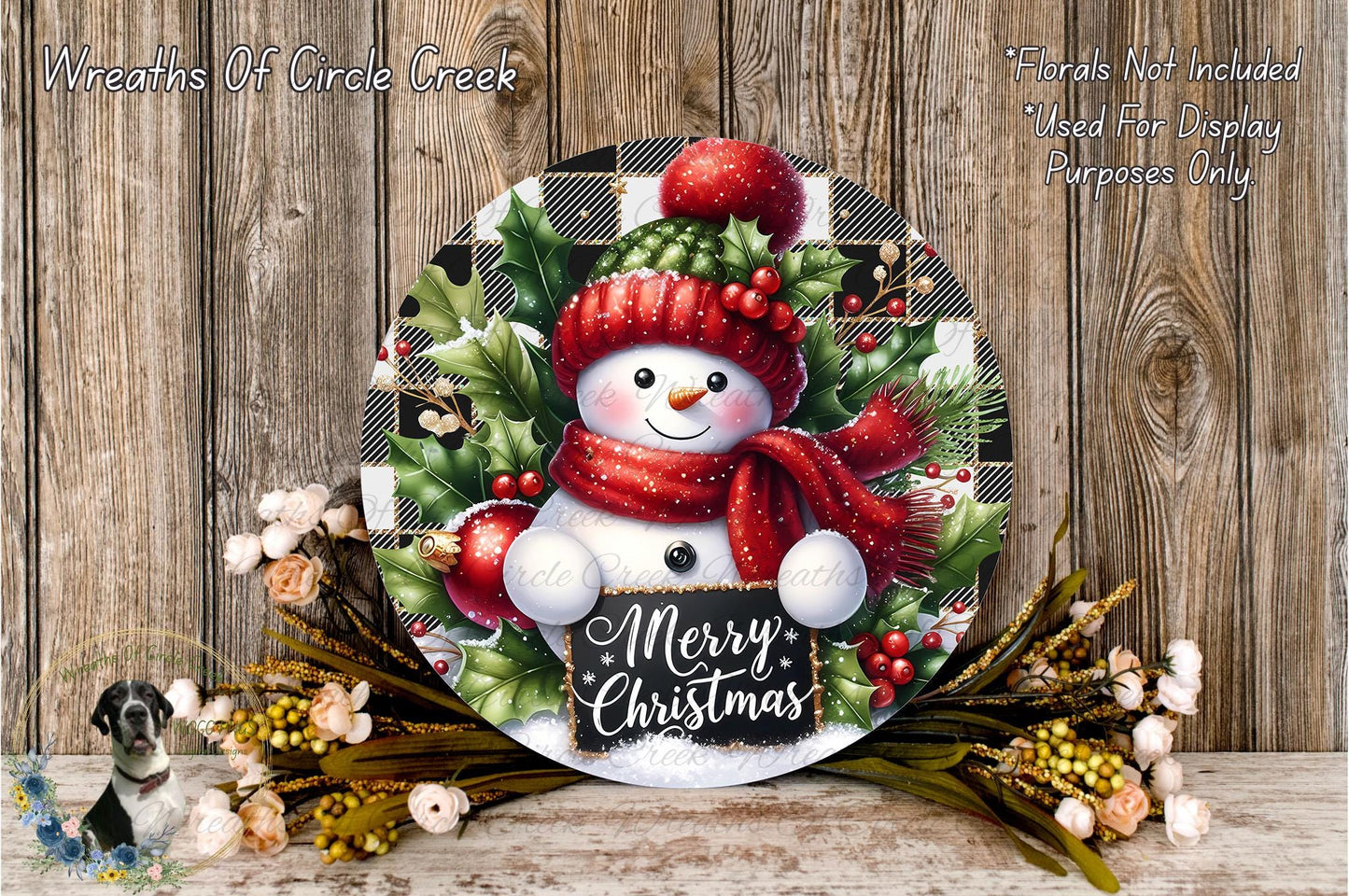 A festive Christmas wreath with a snowman, berries, and a "Merry Christmas" sign, set against a rustic wooden background.