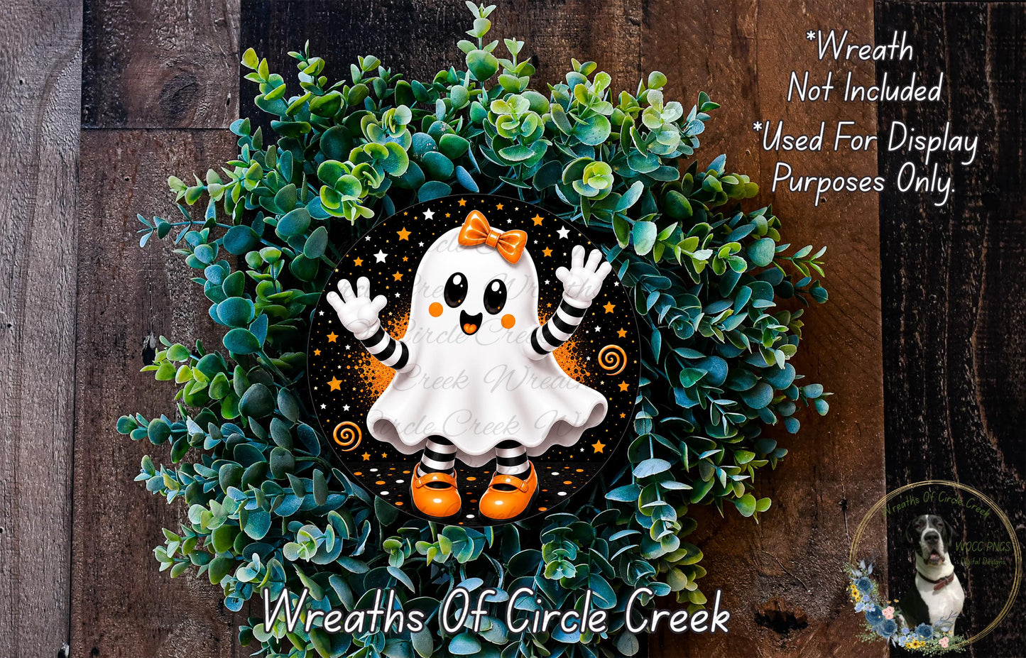 A Halloween-themed wreath made of green foliage and featuring a ghost character with orange shoes and a bow.