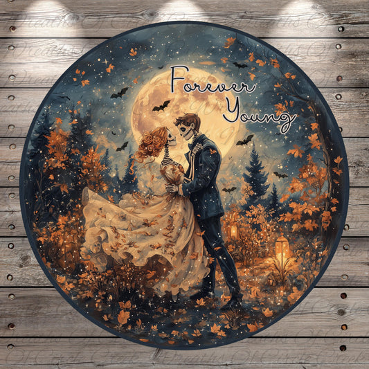 A couple embracing under a full moon in a forest setting, surrounded by autumn foliage and bats.