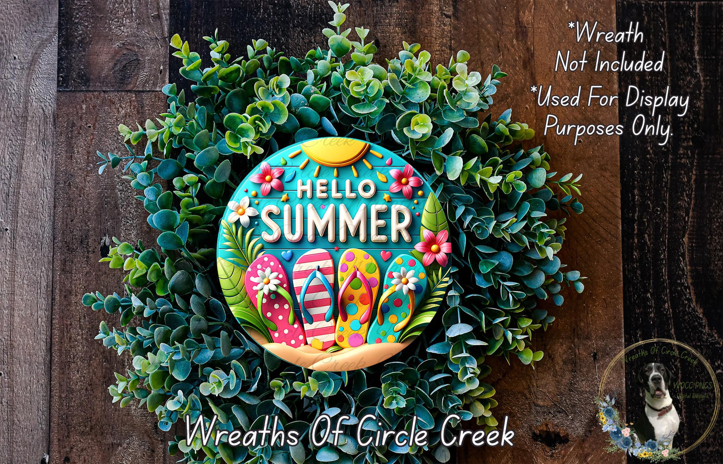 A colorful wreath made of various plants and flowers, with a circular sign that says "Hello Summer" in the center.