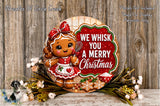 A festive Christmas wreath featuring a gingerbread girl holding a sign that says "We Whisk You a Merry Christmas". The wreath is surrounded by flowers and other holiday decorations, creating a cheerful and seasonal atmosphere.