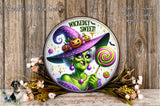 a picture of a witch holding a lollipop