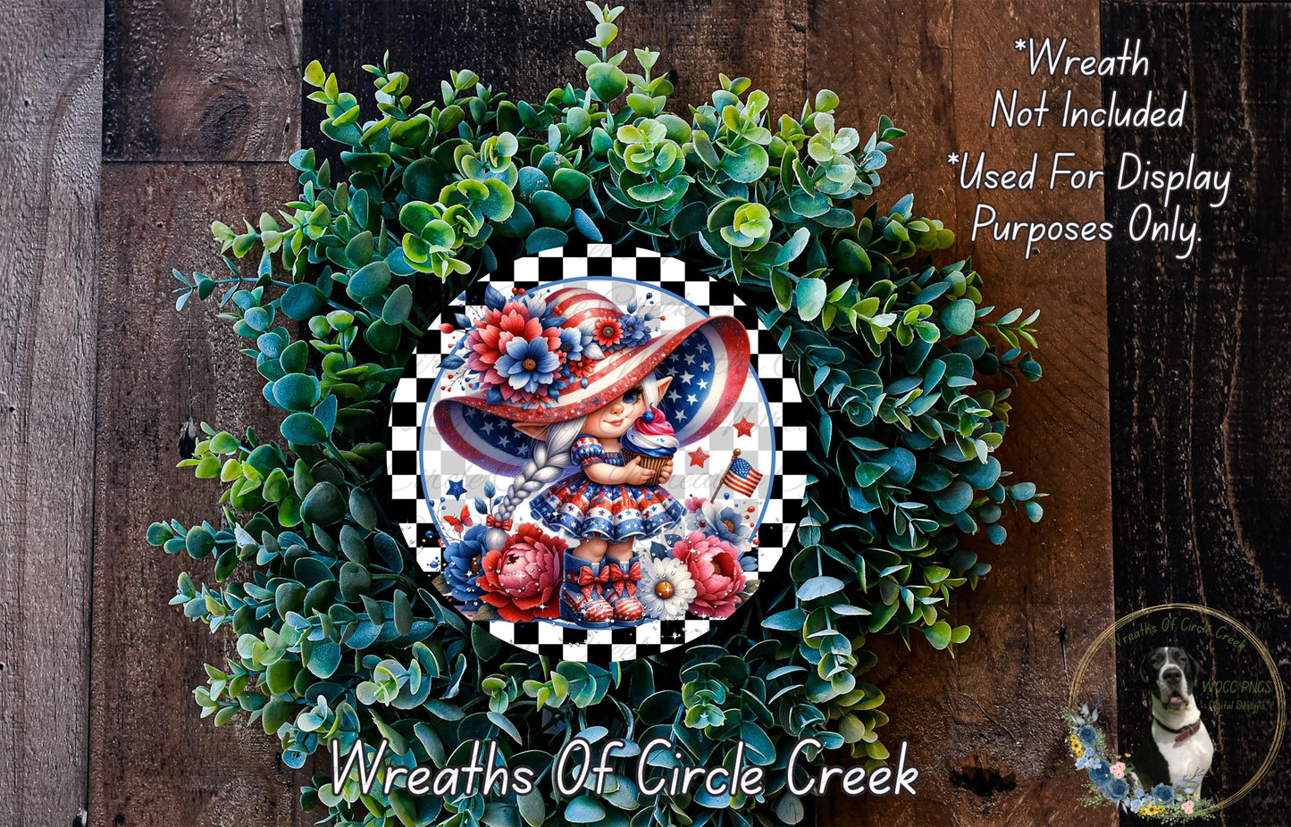 a wreath with a patriotic theme, including a woman wearing a hat with an American flag design. The wreath is surrounded by a variety of green foliage, creating a vibrant and festive appearance.