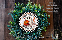 a wreath made of green foliage and a pumpkin, with a ghost holding a pumpkin in the center. The wreath is described as a "Wreath Not Included" and "All Year Round" decoration, and it is used for display purposes only. The image is a collage of multiple images, and the phrase "Wreaths of Circle Creek" is written at the bottom.