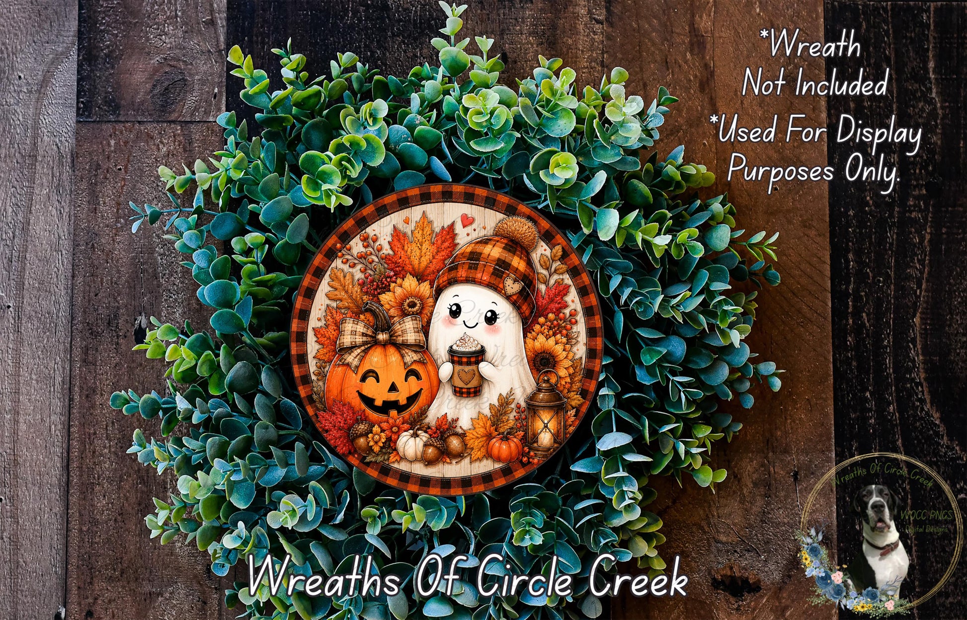 A wreath made of green leaves and a pumpkin, with a ghost and a dog in the center.
