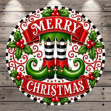A festive Christmas-themed design featuring a circular banner with the text "MERRY CHRISTMAS" surrounded by decorative elements such as holly leaves, berries, and a pair of green and black striped boots.