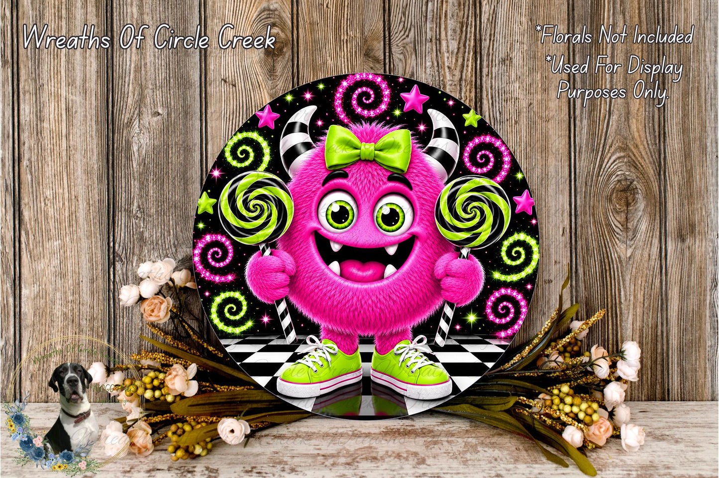 A whimsical, cartoonish monster character with horns and a bow tie is surrounded by colorful spiral designs and flowers, creating a playful and festive atmosphere.