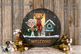 A festive wreath of Circle Creek, featuring a Santa Claus reindeer, a birdhouse, and a "Welcome" sign, surrounded by flowers and a wooden background.