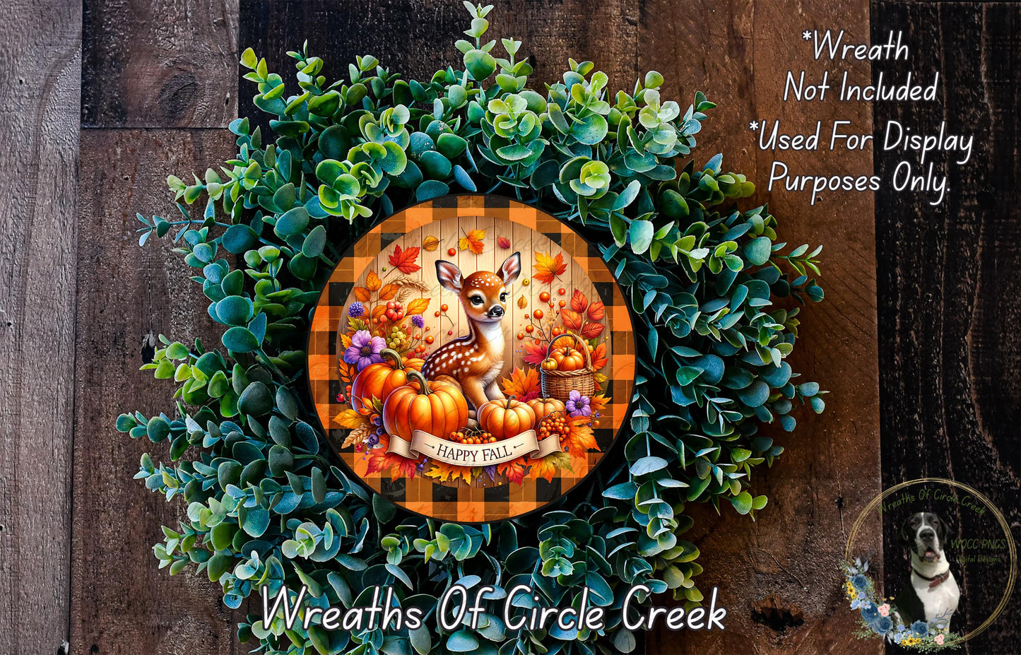 A wreath made of green leaves and orange and white checkered borders, featuring a deer and pumpkins, with the text "Wreath Not Included * Used For Display Purposes Only" and "Wreaths of Circle Creek" below.