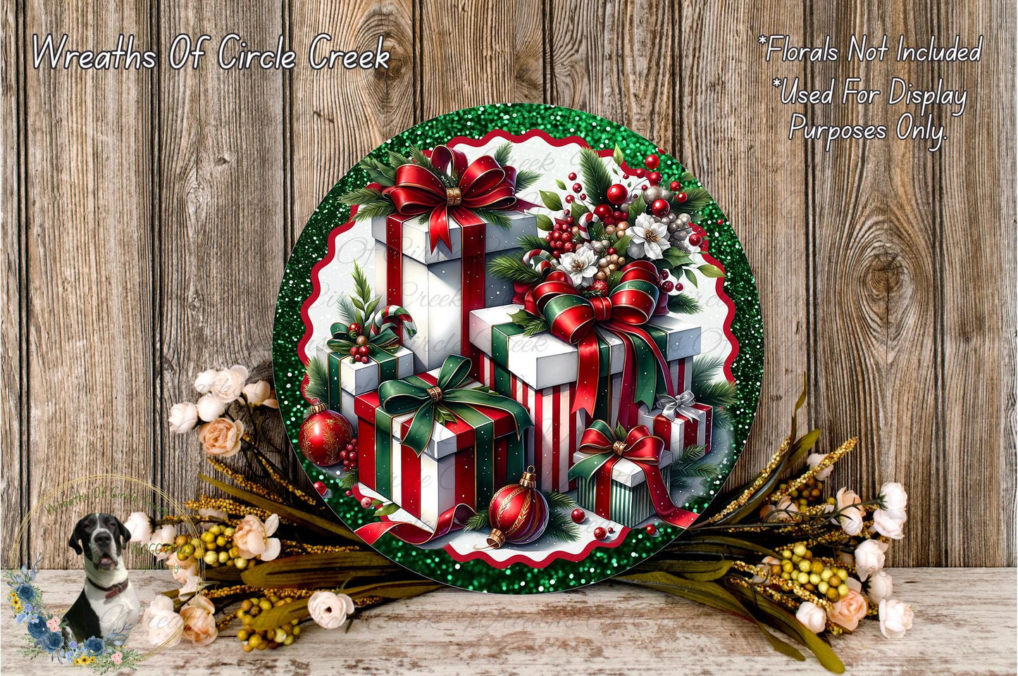 a festive Christmas wreath with a variety of holiday decorations, including wrapped gifts, ornaments, and greenery. The wreath is displayed on a wooden surface, and the background is a rustic wooden wall.