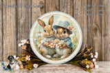 A decorative plate featuring two rabbits wearing hats and holding flowers, surrounded by a floral arrangement and a wooden background.