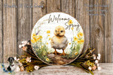 a round wooden plaque with a cheerful yellow chick surrounded by flowers and greenery, set against a rustic wooden background.