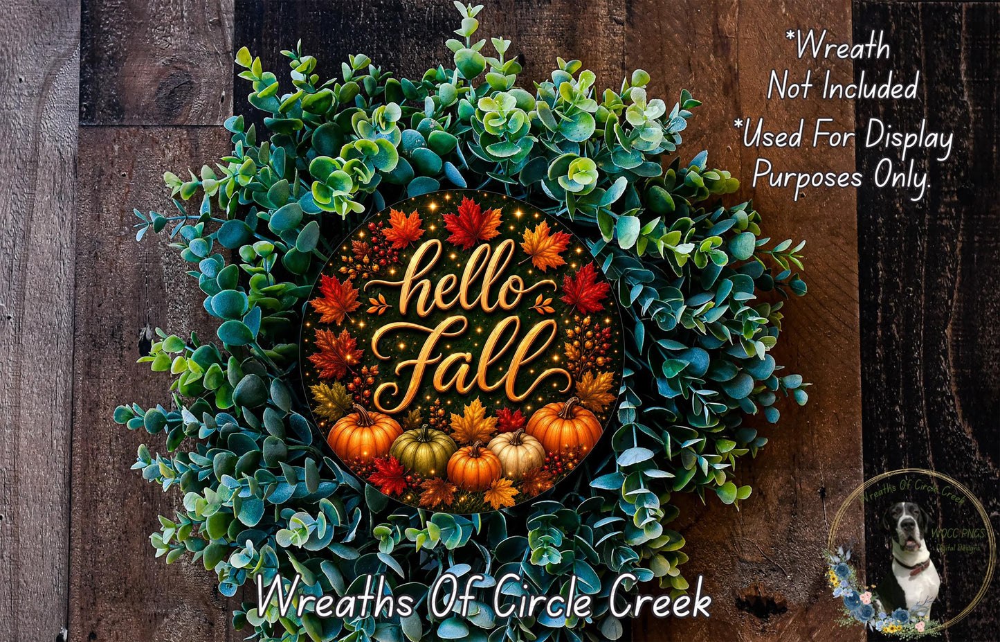 A wreath made of various fall-themed elements, including leaves, pumpkins, and a golden "Hello Fall" sign, is displayed against a wooden background.