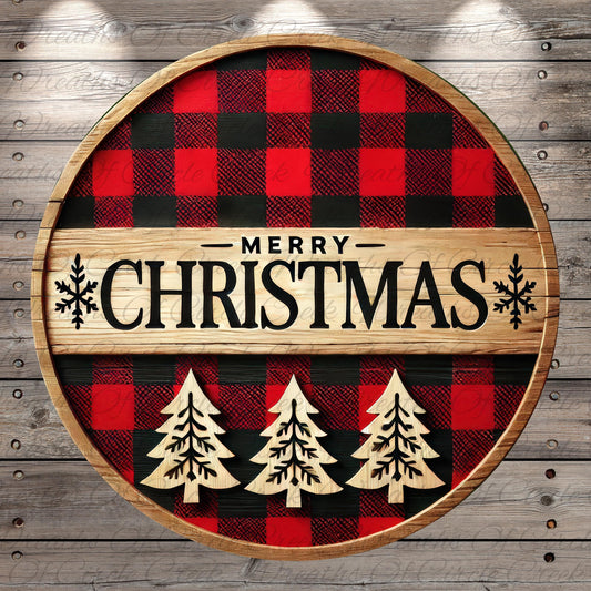 A circular wooden sign with a red and black plaid pattern, featuring the text "MERRY CHRISTMAS" in bold black letters. The sign is surrounded by three wooden Christmas trees, creating a festive and holiday-themed design.