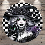 A digital illustration of a woman with striking green eyes, wearing a black hat adorned with roses, holding a black cat with glowing green eyes.