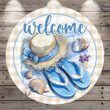 a round sign with a beach-themed design, including a straw hat, flip flops, seashells, and a starfish.