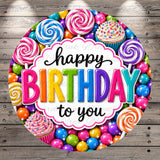 A colorful birthday card with a variety of sweets and candies surrounding the text "happy birthday to you".