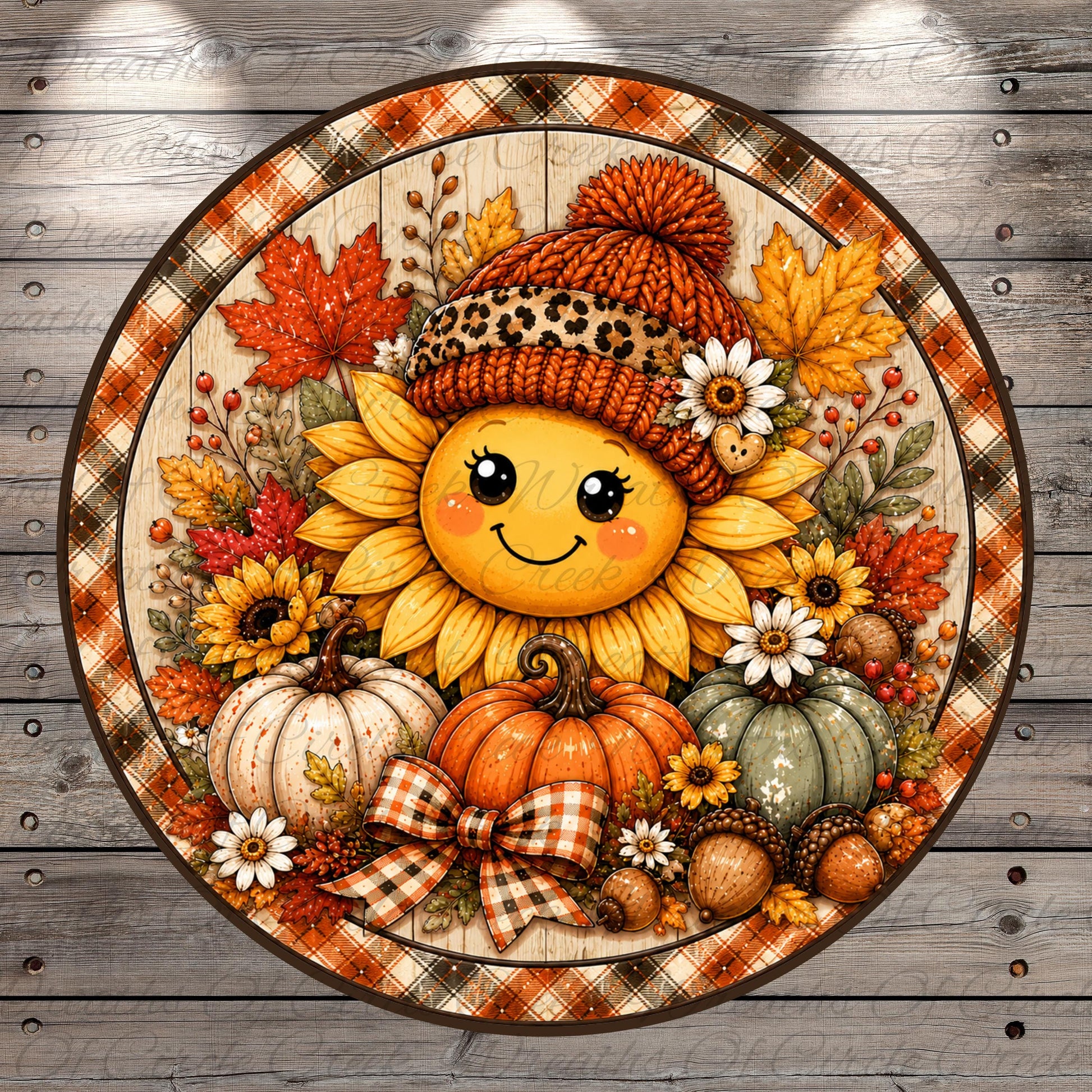 A cheerful sunflower wearing a knitted hat and surrounded by autumn decorations, including pumpkins, acorns, and leaves, all set against a wooden background.