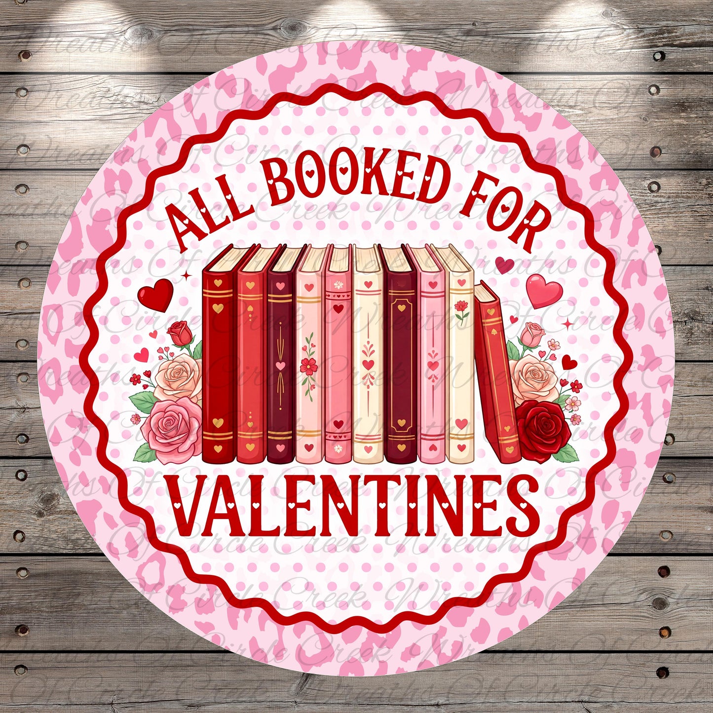 A circular sign with a pink and white color scheme, featuring a row of books and the text "All Booked for Valentine's Day" in red.