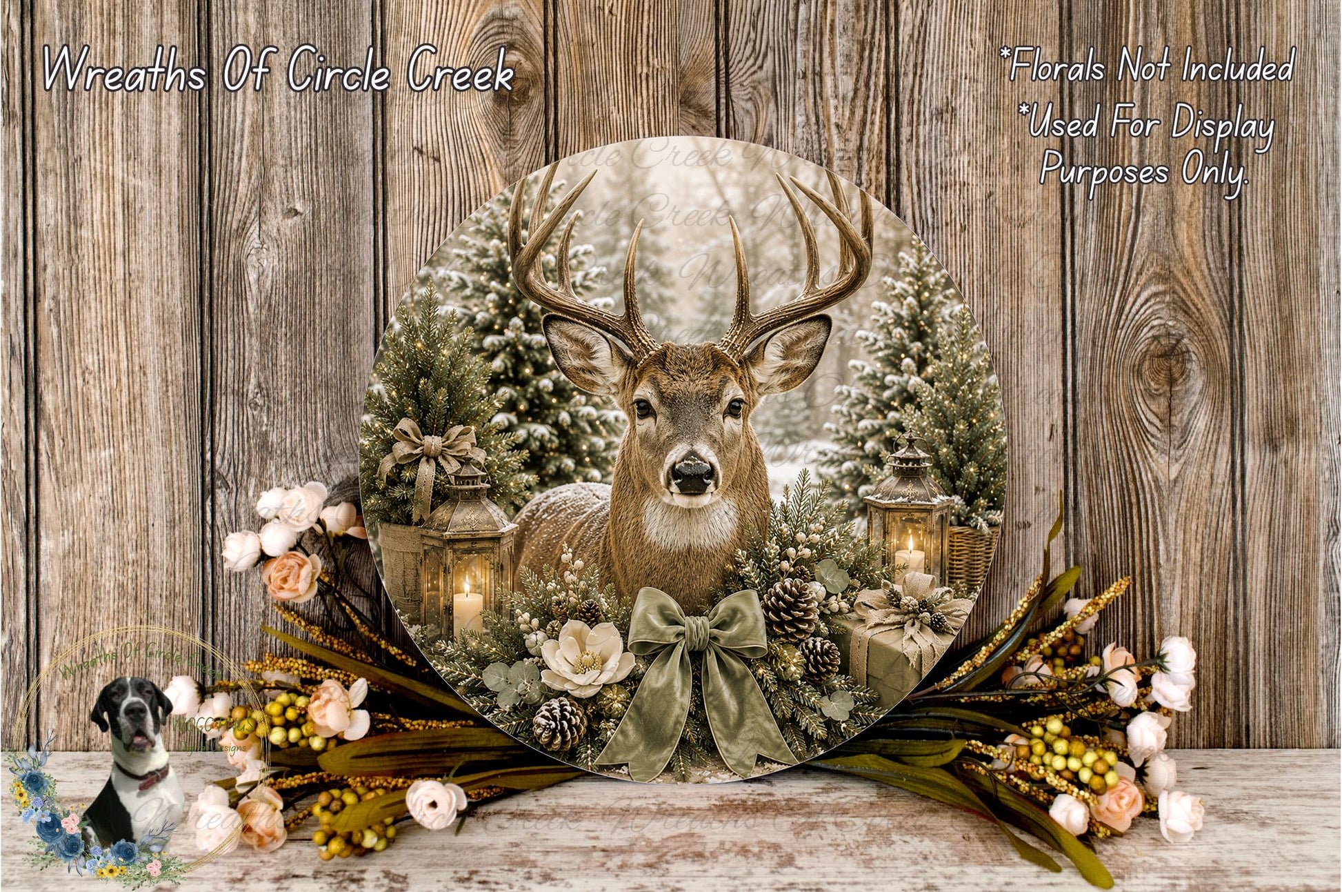 A deer with antlers is surrounded by a wreath of flowers and pine cones, with a lantern and other holiday decorations, against a backdrop of a snowy forest.