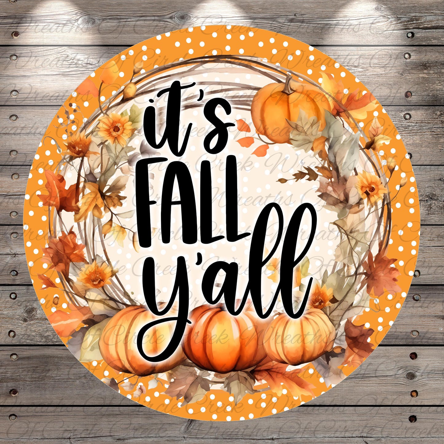 A circular decorative plate with a wreath of autumn leaves and pumpkins surrounding the text "It's FALL Y'ALL" in a vibrant orange and yellow color scheme.