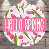 A circular design with a pink background featuring a repeating pattern of pink tulips and the text "Hello Spring" in white.