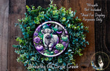 a wreath with a cow, pumpkins, and a ghost, surrounded by green foliage. The wreath is described as a "Wreath of Circle Creek" and is not included in a display for Halloween purposes.
