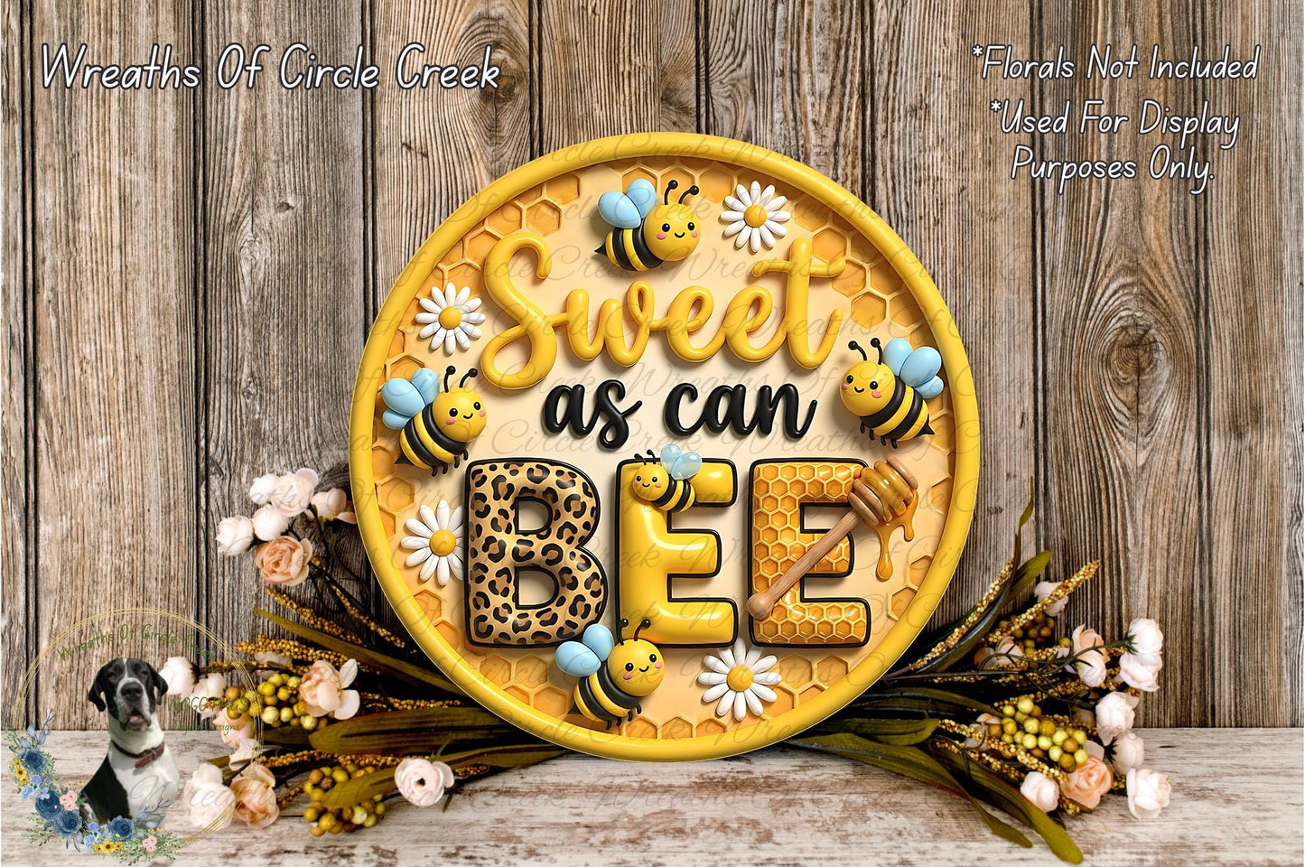 a decorative sign with the text "Sweet as can be" surrounded by bee-themed elements, such as honeycomb and bees, against a wooden background.