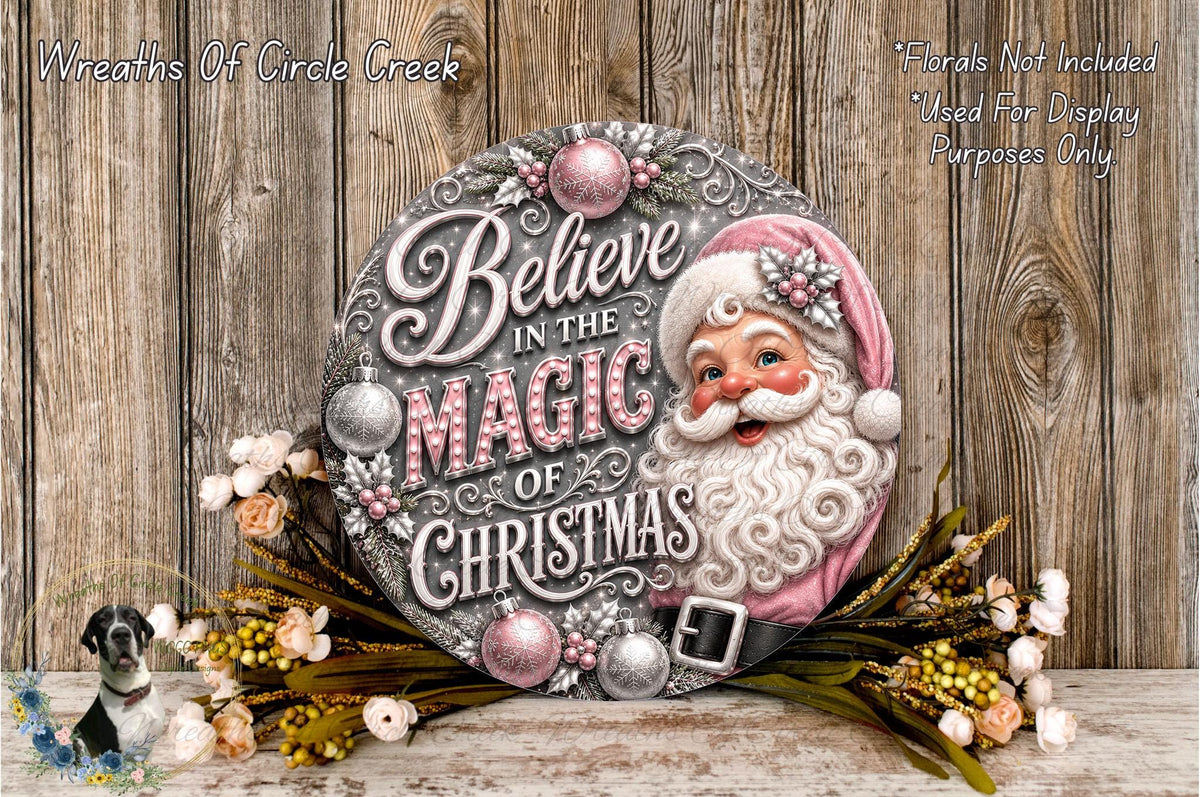 A decorative sign featuring a smiling Santa Claus surrounded by flowers and text that reads "Believe in the Magic of Christmas".