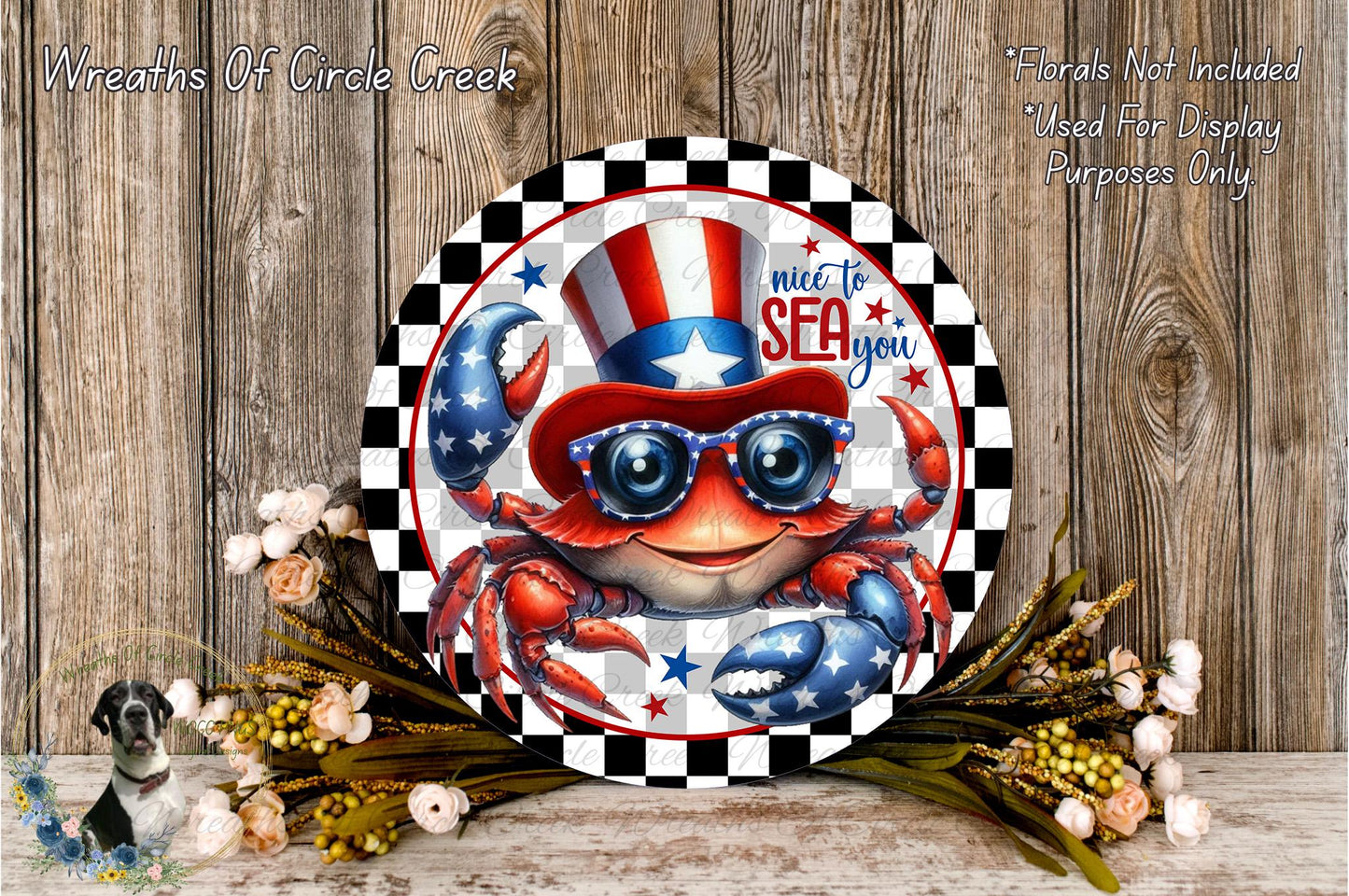 A decorative plate featuring a crab wearing sunglasses and a patriotic hat, surrounded by flowers and a wooden background.