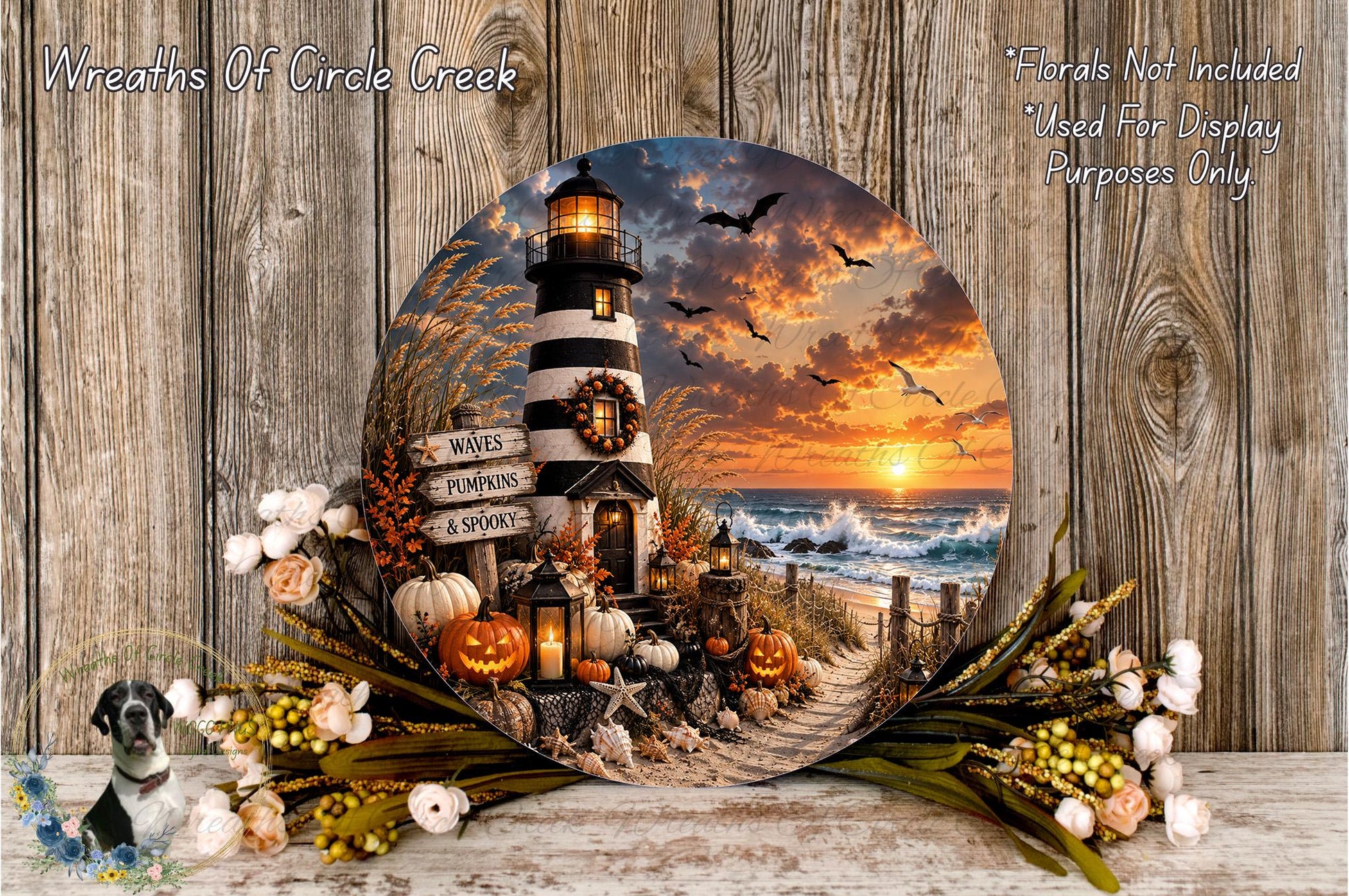 A circular wall hanging depicting a lighthouse surrounded by autumn decorations, including pumpkins, gourds, and a spooky pumpkin lantern, with a beach and sunset in the background.