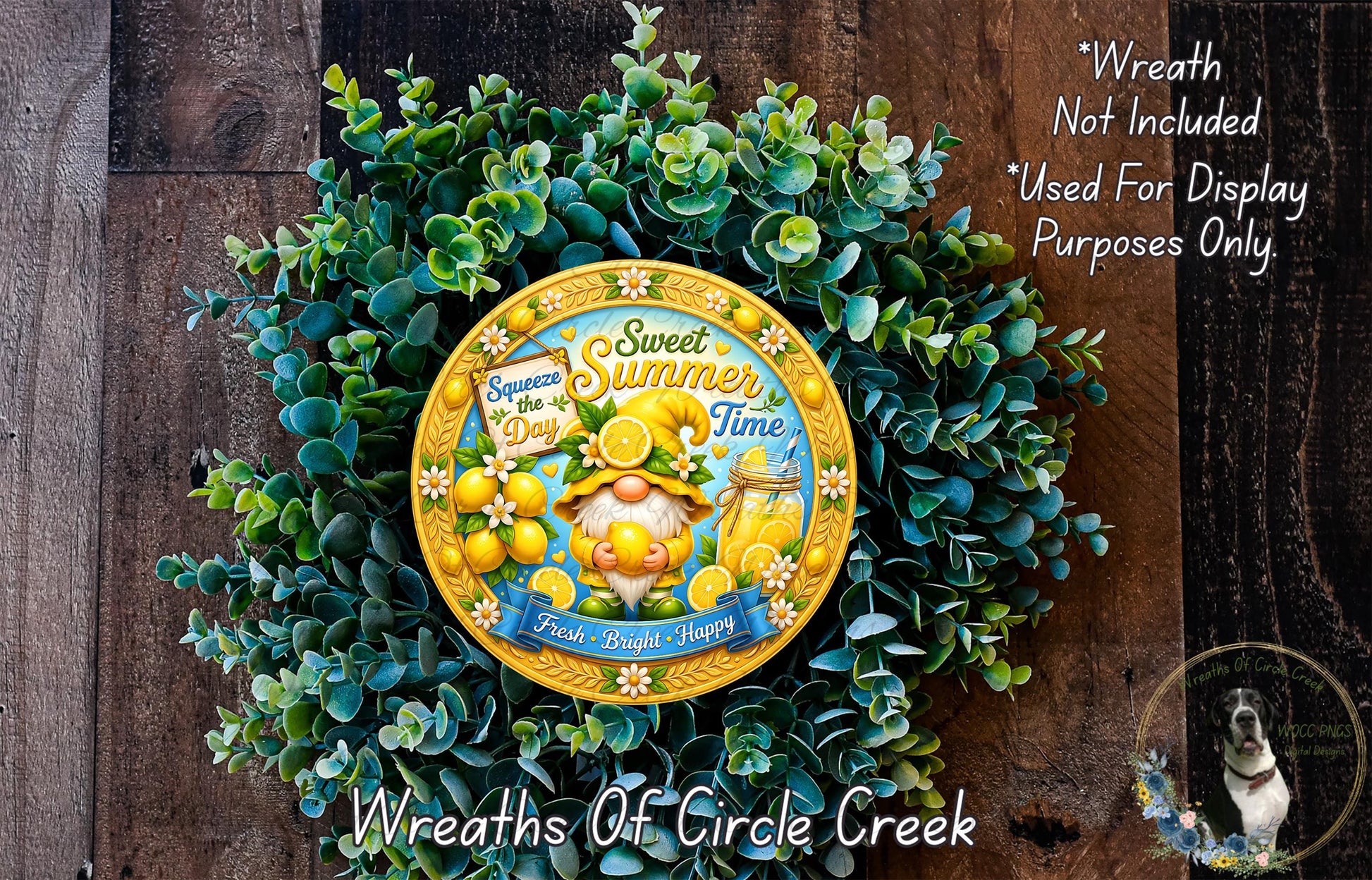 a wreath made of green leaves and a yellow plate with a gnome and lemon design, placed on a wooden surface.