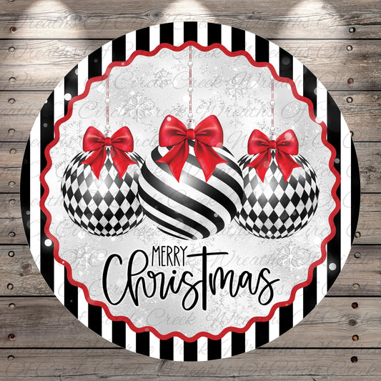 A festive Christmas-themed image featuring three black and white striped Christmas ornaments with red bows, surrounded by a decorative border with the text "Merry Christmas" displayed on it.