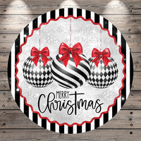 A festive Christmas-themed image featuring three black and white striped Christmas ornaments with red bows, surrounded by a decorative border with the text "Merry Christmas" displayed on it.