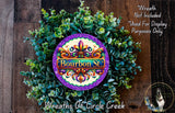 a wreath made of green leaves and a purple circular emblem with the text "Bourbon St." The wreath is displayed on a wooden surface, and there is a small dog in the bottom right corner.