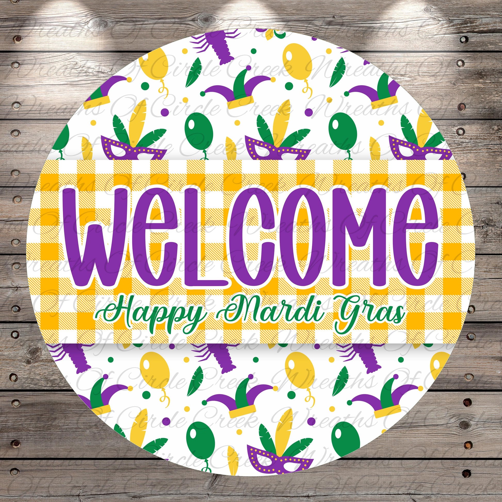 A circular welcome sign with the text "WELCOME Happy Mardi Gras" displayed prominently in the center. The sign is surrounded by various Mardi Gras-themed elements, such as balloons, masks, and other festive decorations, creating a cheerful and celebratory atmosphere.