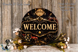 a large circular sign with the word "WELCOME" prominently displayed in the center, surrounded by various casino-themed elements such as playing cards, chips, and a chandelier. The sign is set against a rustic wooden background, with a floral arrangement of flowers and greenery placed in front of it.