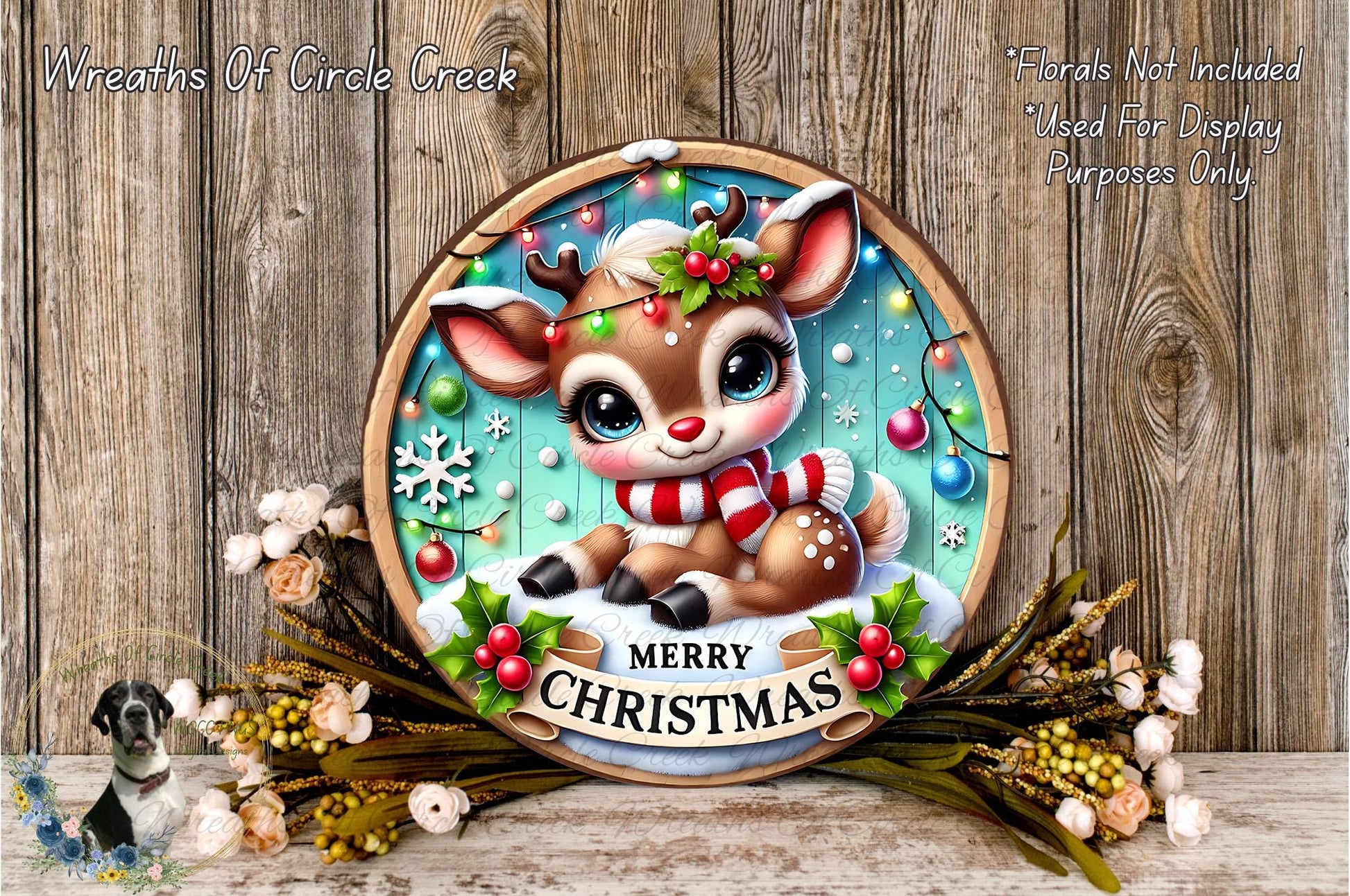 A festive Christmas wreath featuring a cartoon reindeer with a "Merry Christmas" banner, surrounded by holiday decorations such as flowers and greenery.