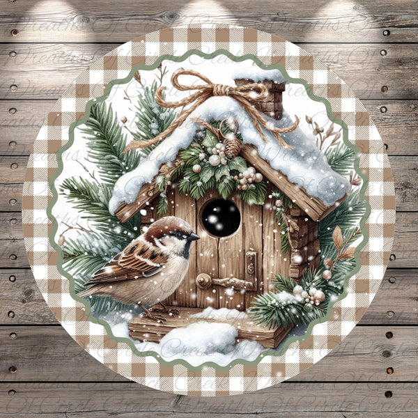 A wooden birdhouse with a snow-covered roof, surrounded by pine branches, pine cones, and a small bird perched on the roof.