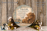 A decorative wooden plaque with a mother cow and her baby, surrounded by flowers and a baby carriage, with a quote about letting them be little.