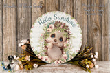 a picture of a baby hedge surrounded by flowers