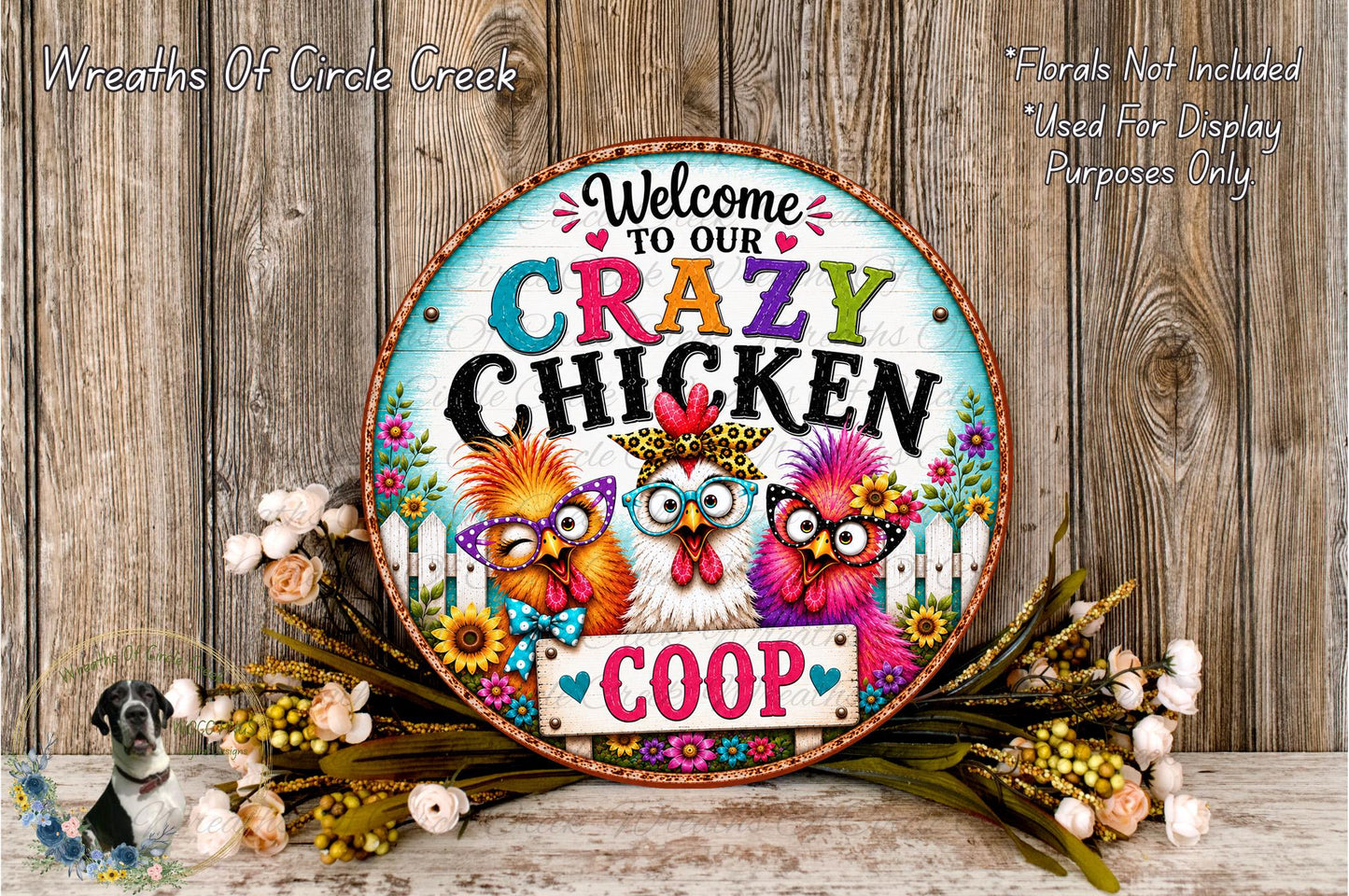 a colorful sign with the text "Welcome to our crazy chicken coop" surrounded by a floral arrangement and a wooden background.