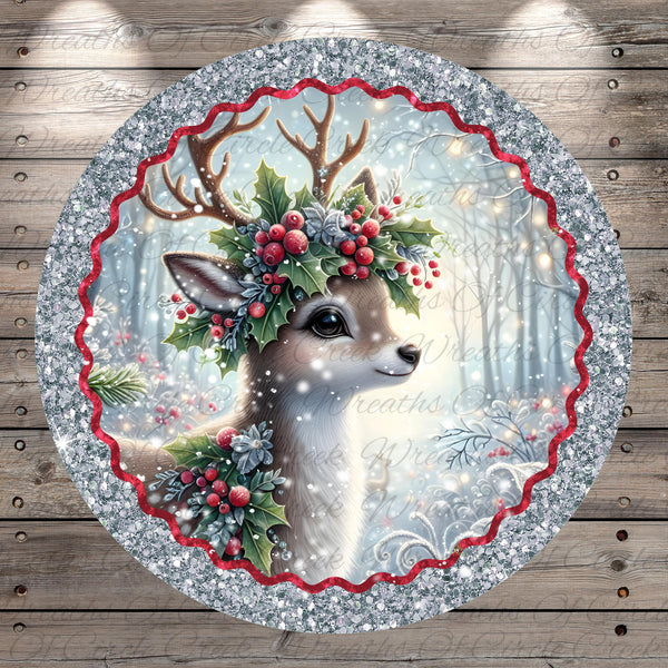 A deer with antlers and a holly wreath on its head is the central focus of the image, surrounded by a decorative border of red and silver glitter.