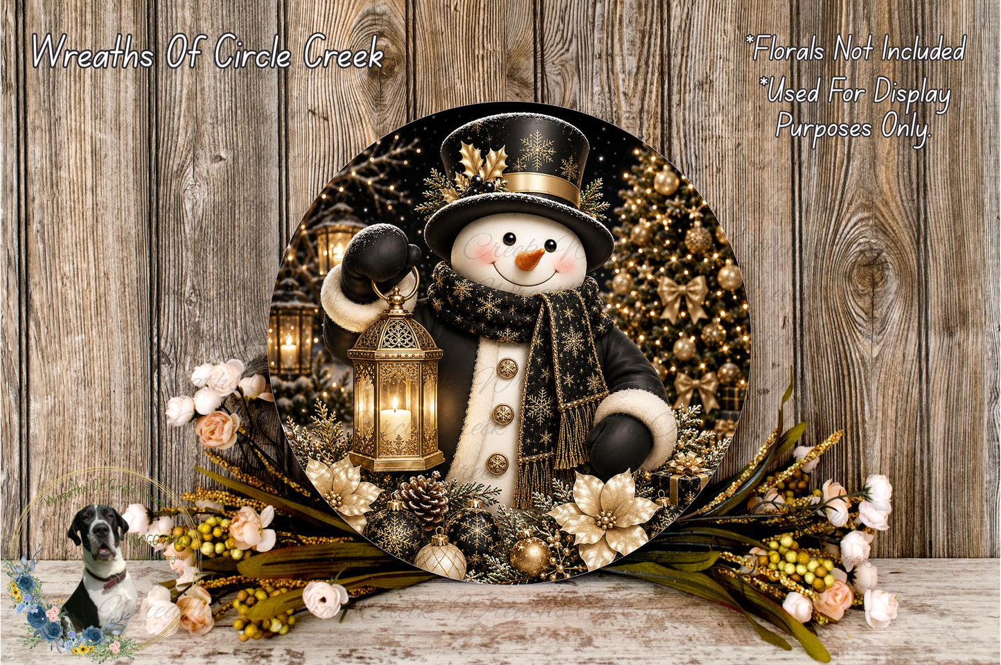 A snowman wearing a black top hat and scarf, holding a lantern, surrounded by a wreath of flowers and a Christmas tree, with a wooden background.