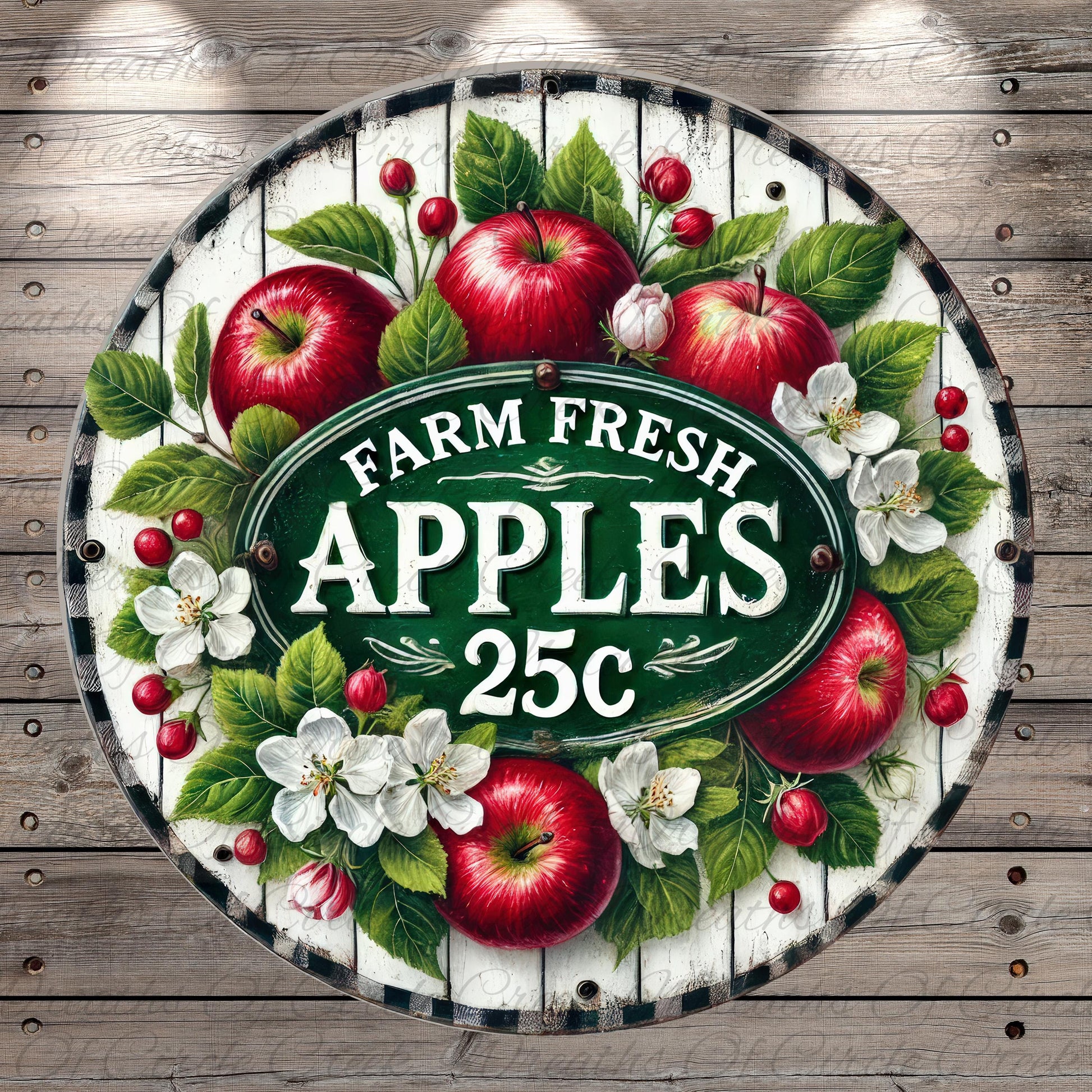 a circular sign with a white border and a green background, surrounded by a wreath of red apples, white flowers, and green leaves. The sign prominently displays the text "FARM FRESH APPLES 25c".